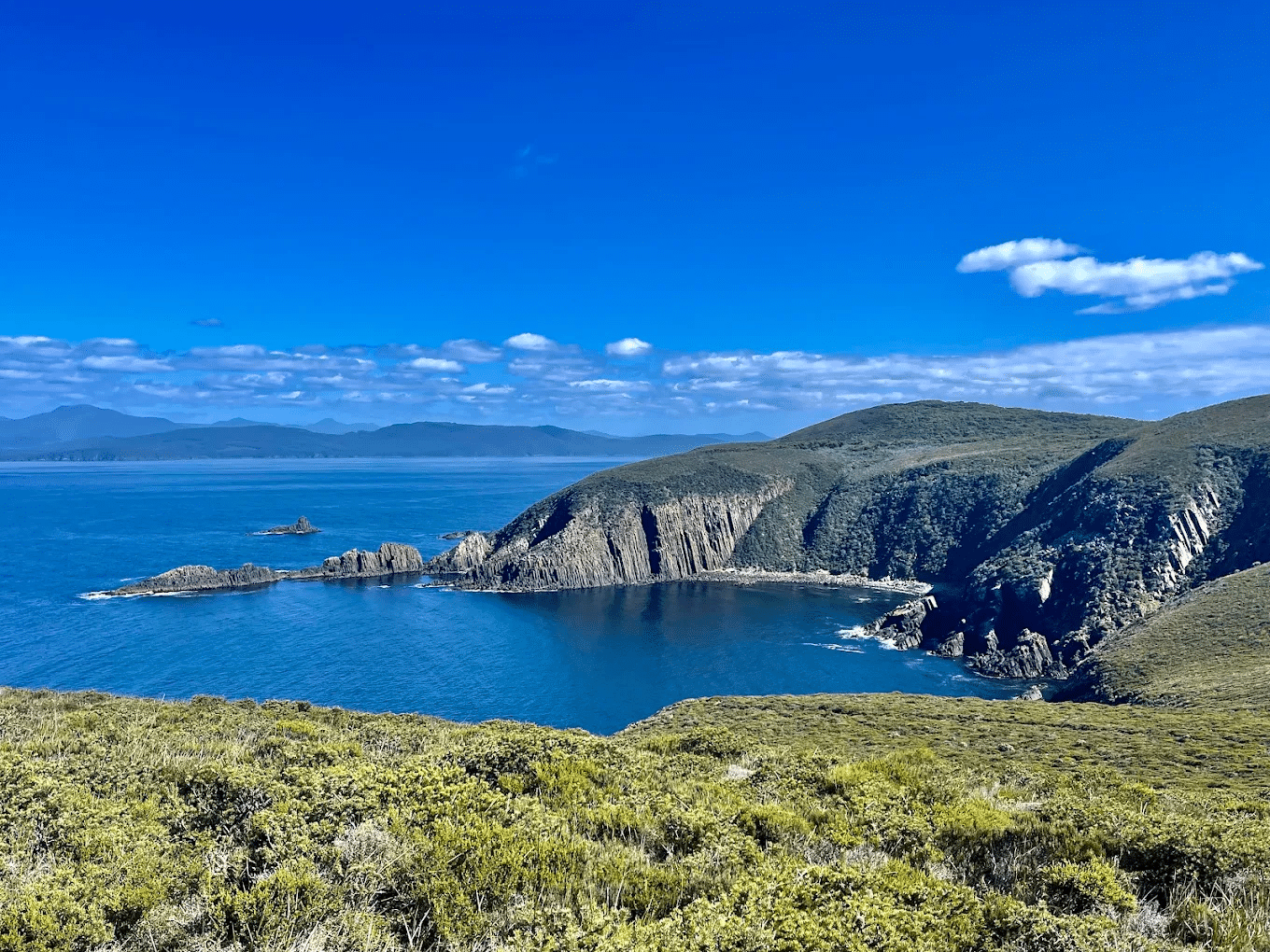 A scenic lake in Hobart's mountainous landscape