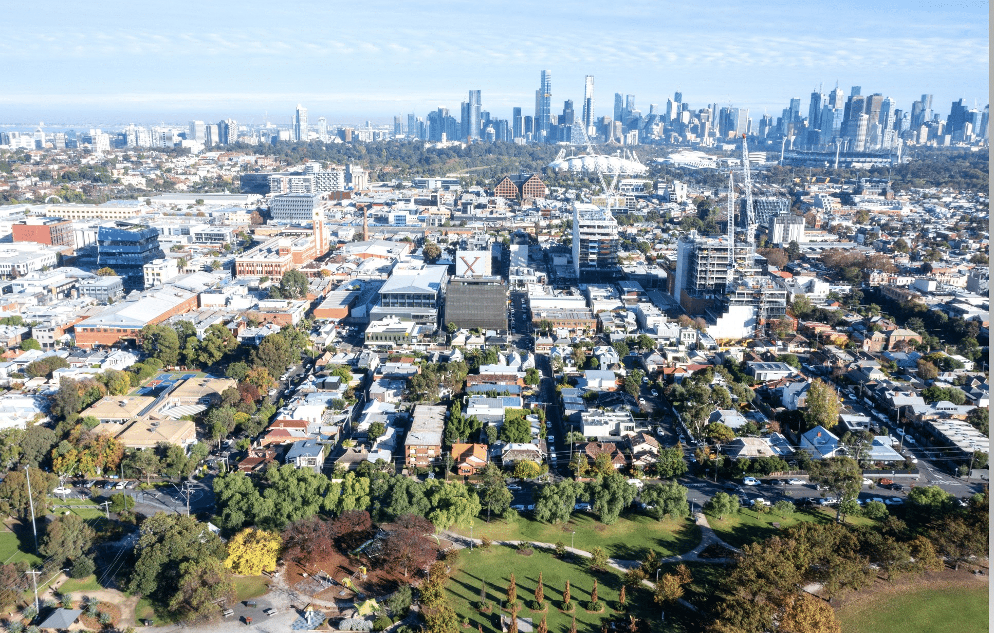 An aerial view of Yarra Melbourne with tall buildings