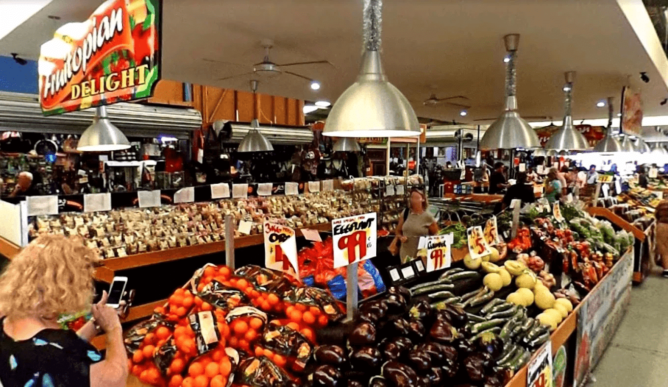 Assorted fruits and vegetables in a store setting