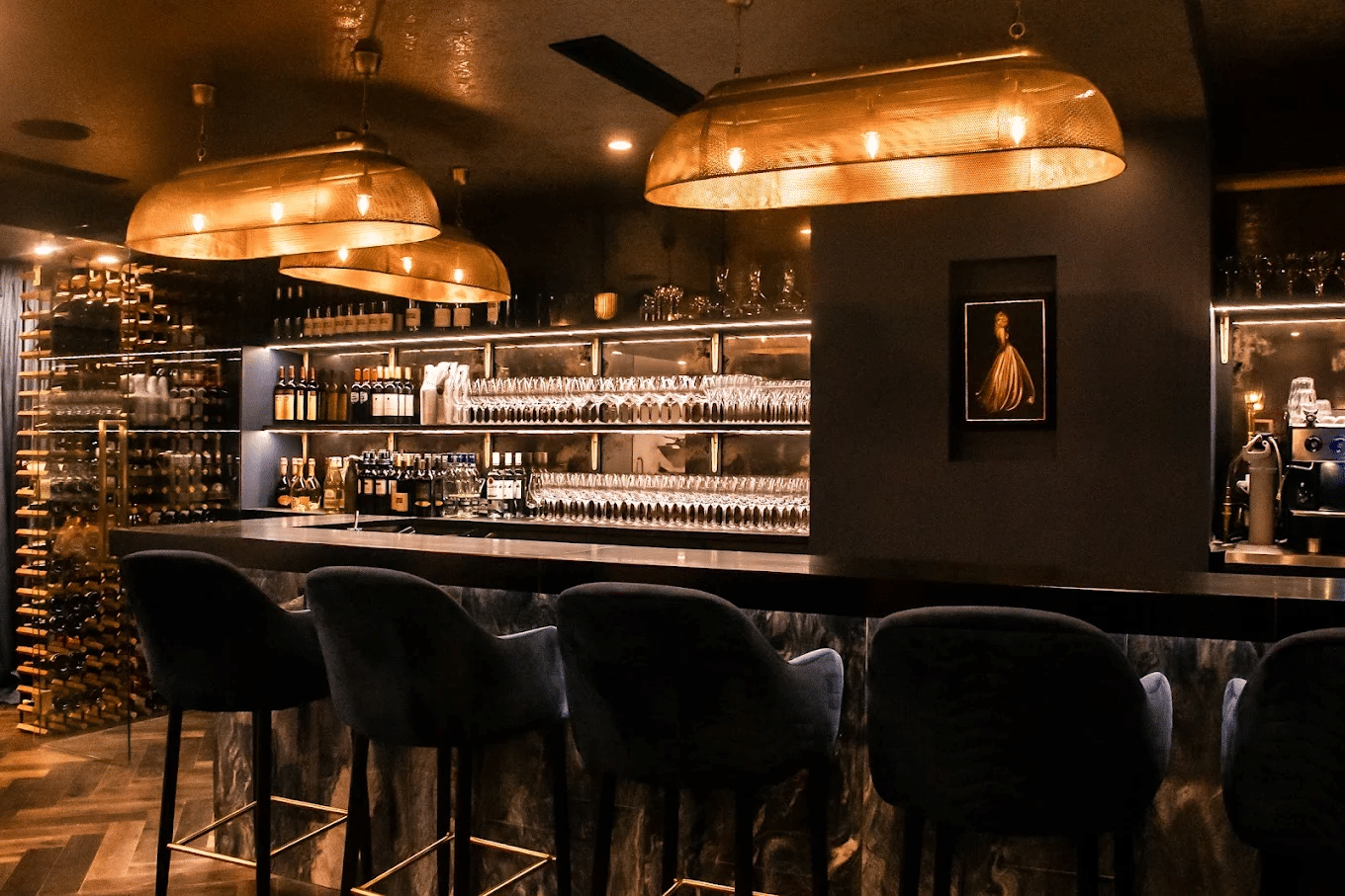 Bar stocked with various wine bottles