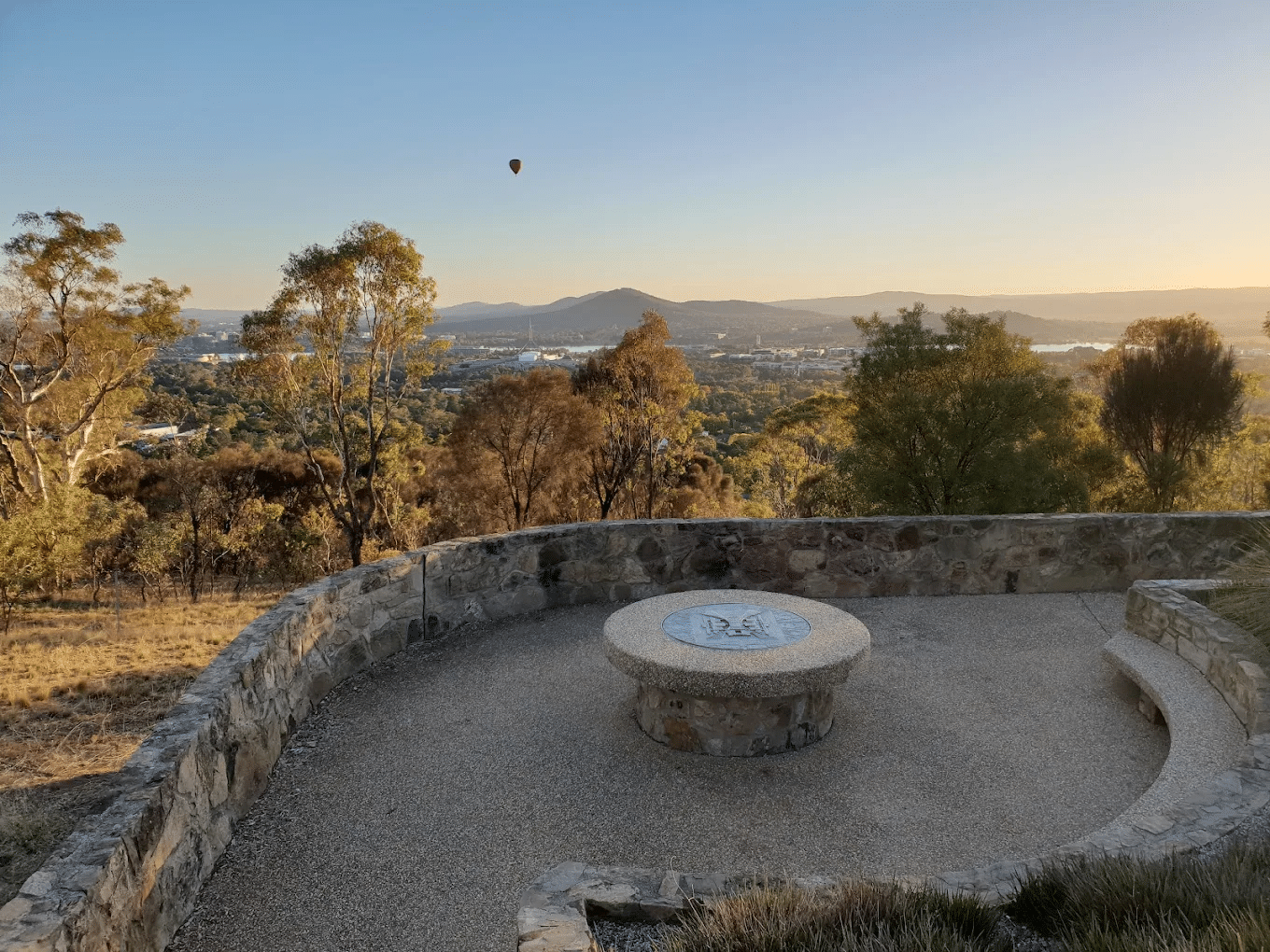 Bench on stone wall in Canberra attraction