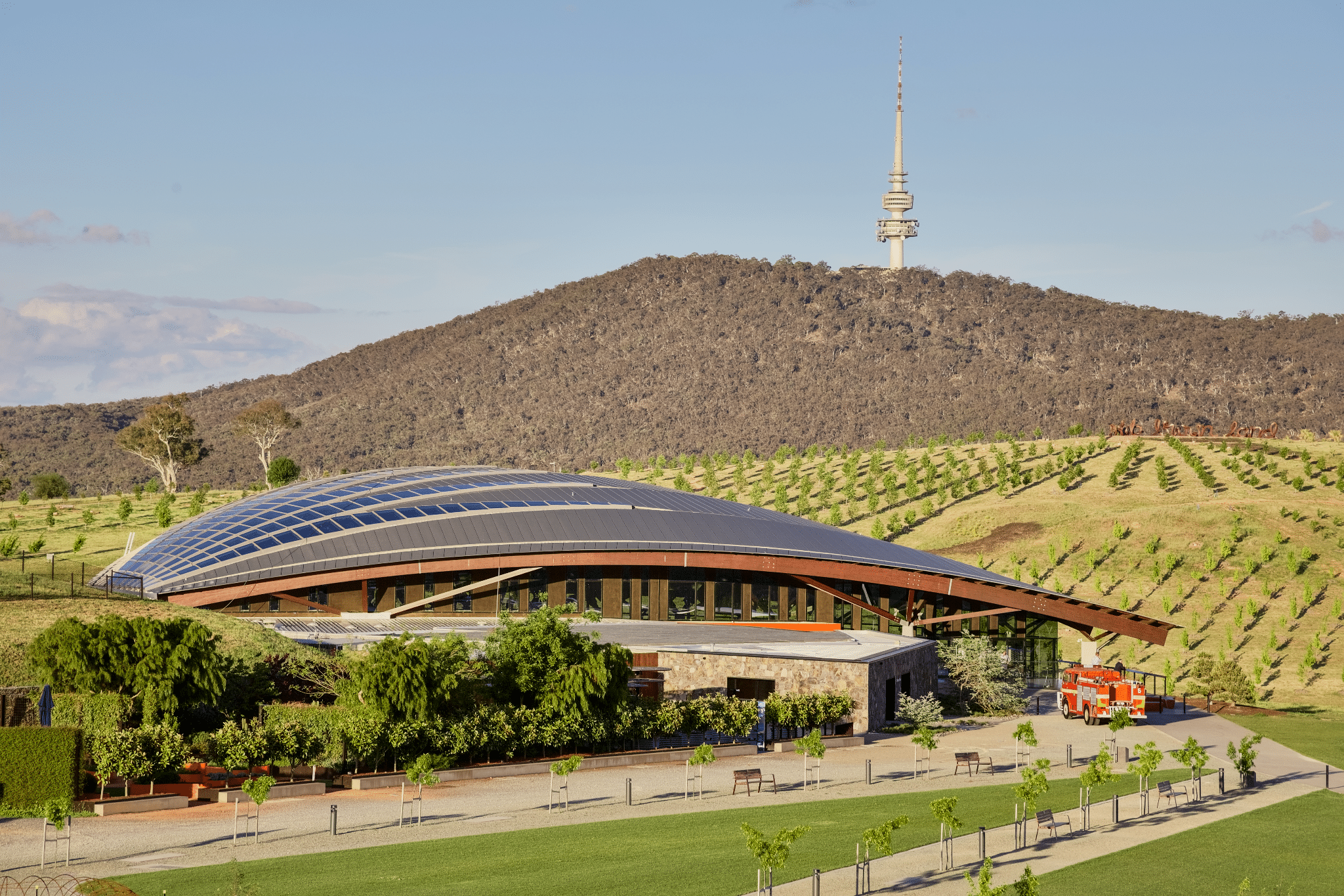 Cityscape of Canberra with mountain backdrop