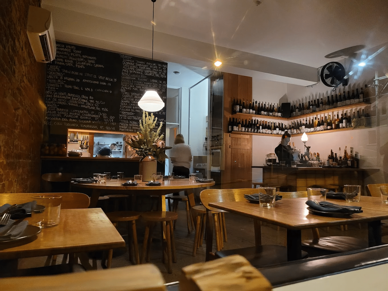 Cozy restaurant interior in Hobart with wooden furniture