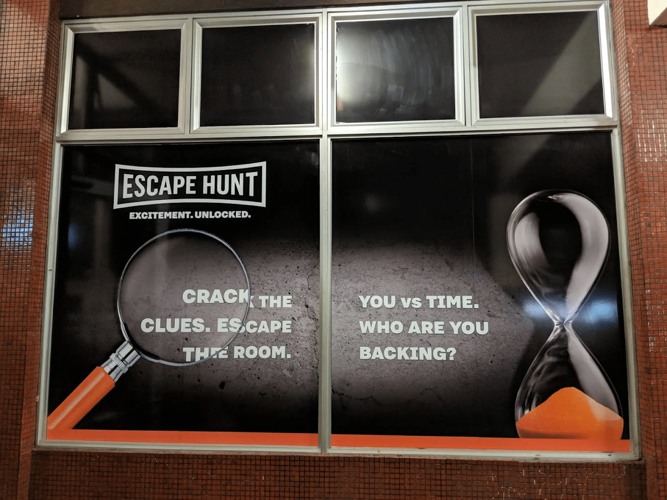 Escape hunt advertisement on Gold Coast window