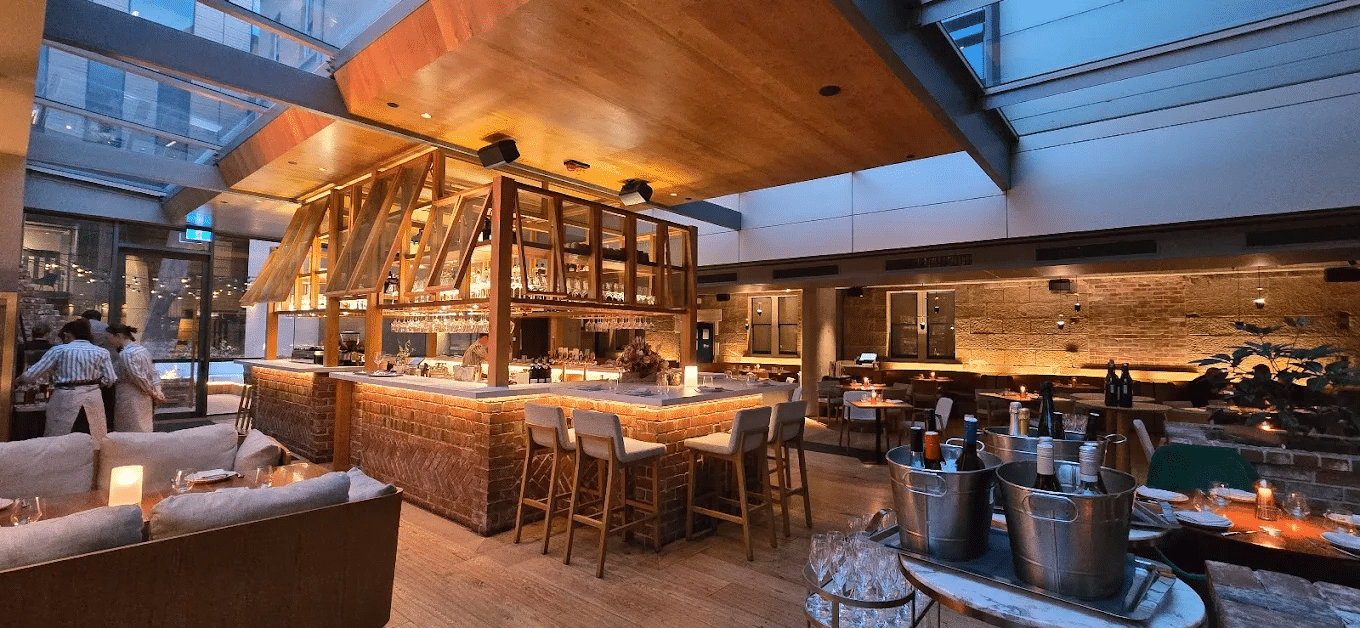 Interior of a spacious restaurant in Hobart with multiple tables and chairs
