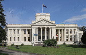 Large white building with flag in Port Phillip Melbourne