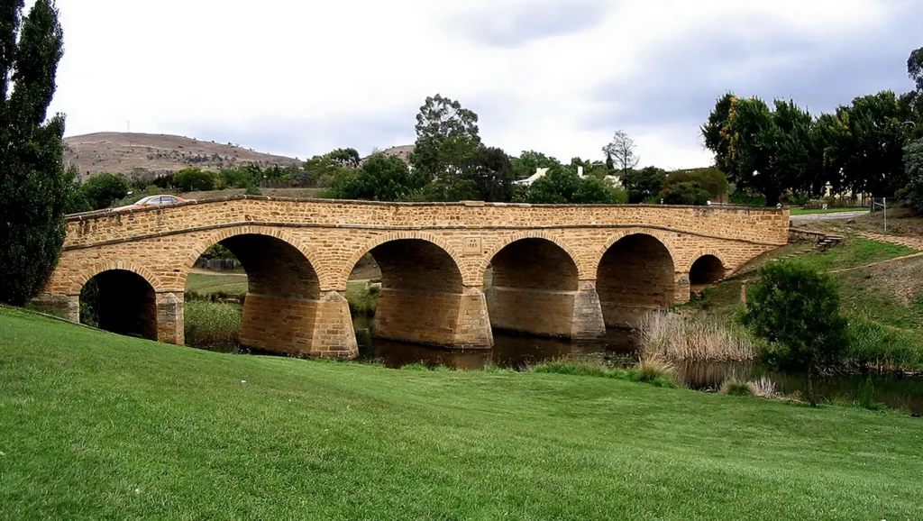 Stone bridge over river in Hobart park