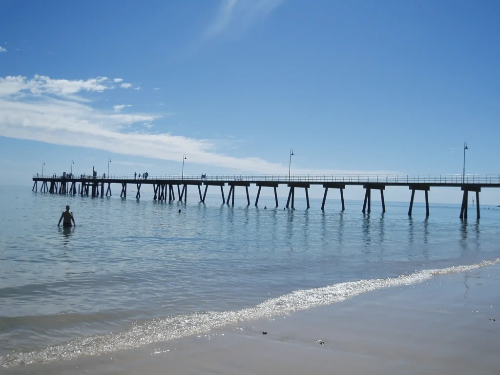 Student enjoys water activity near Adelaide pier during school excursion