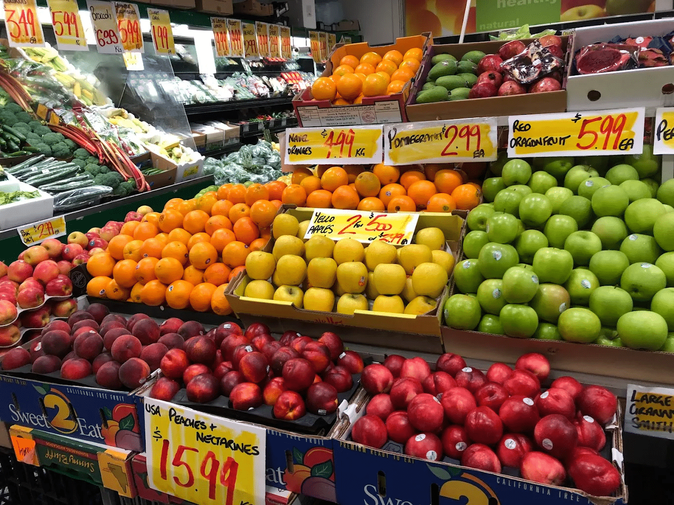 Variety of fruits on display in grocery store during Gold Coast food tour