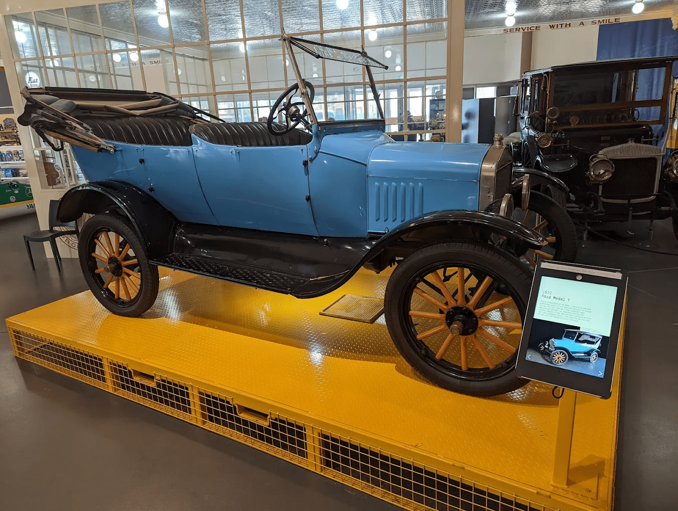 Vintage blue car on display in museum