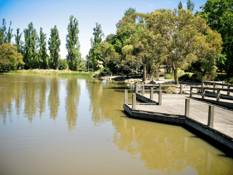 Wooden dock on a serene body of water in Maroondah