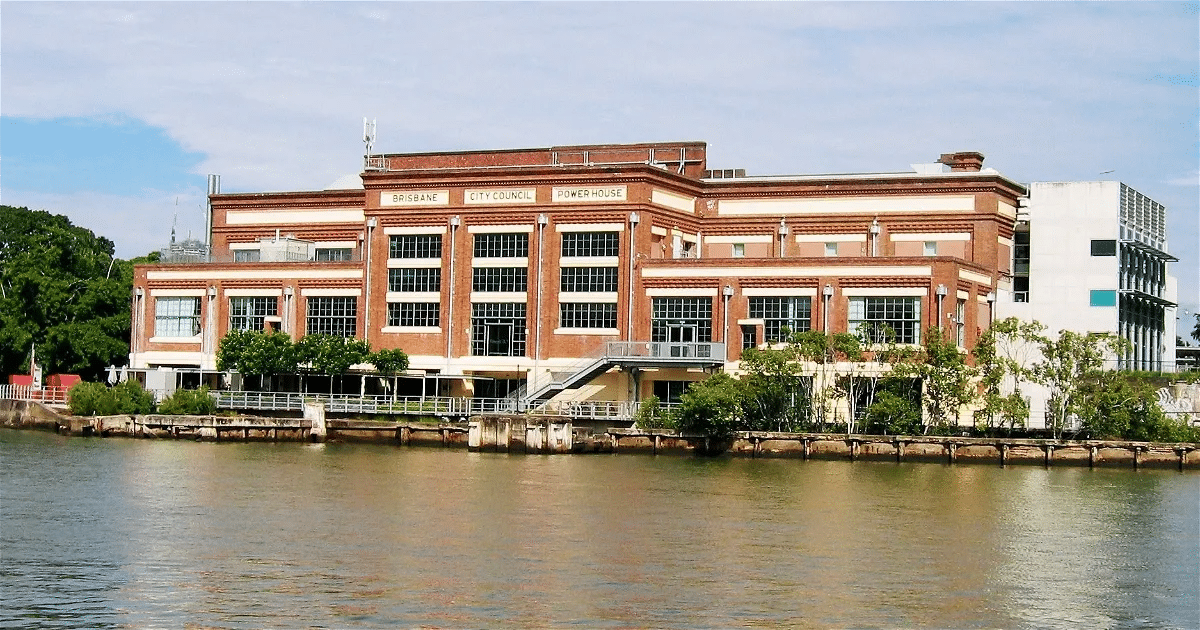 A brick music venue beside a river in Brisbane