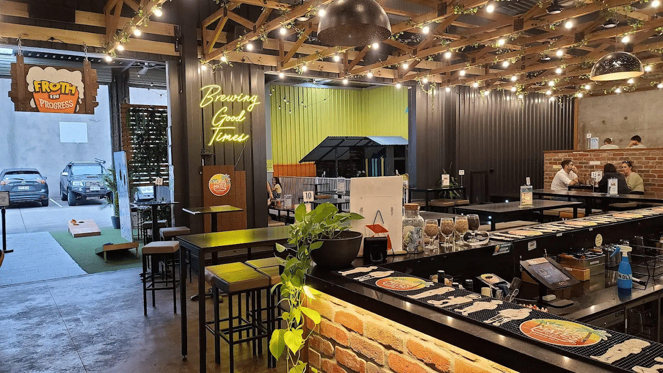 A cozy restaurant setting with hanging lights in Sunshine Coast