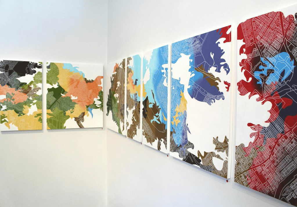 A group of paintings in a Brisbane art gallery