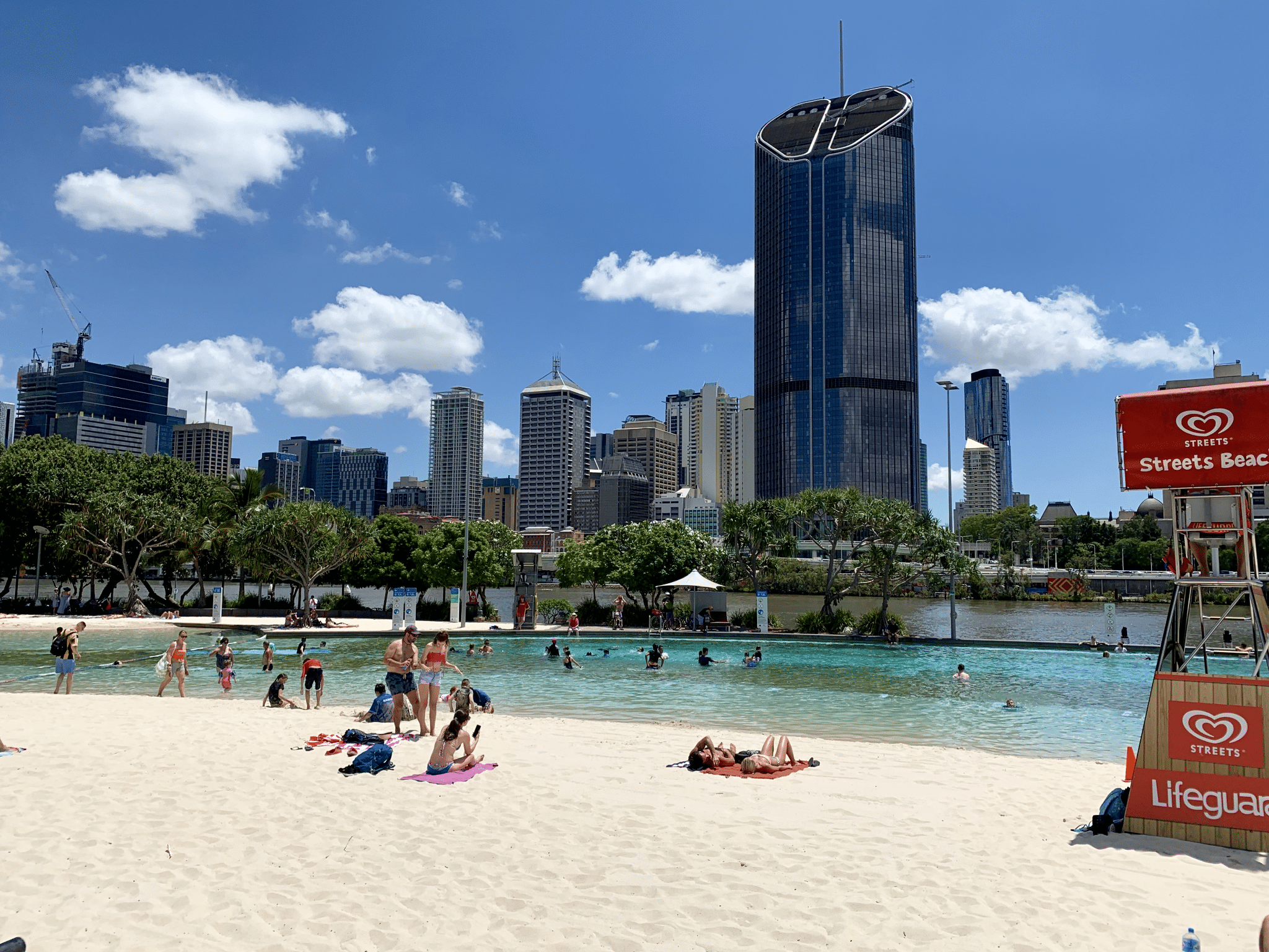 A group of people enjoying South Bank Parklands beach in Brisbane