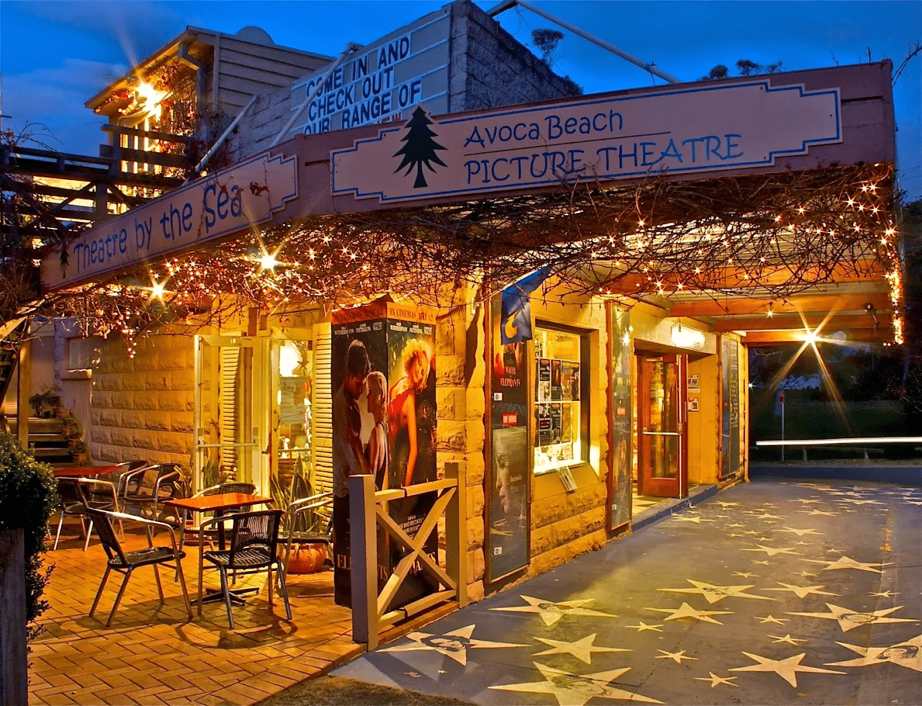 A picture theatre illuminated at night on Central Coast
