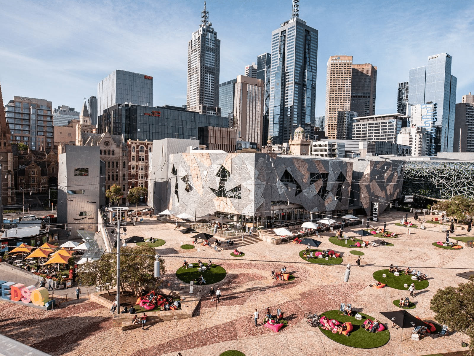 Aerial view of Melbourne showcasing bustling streets and historical sites
