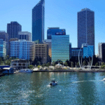 Aerial view of Perth cityscape with water and skyscrapers