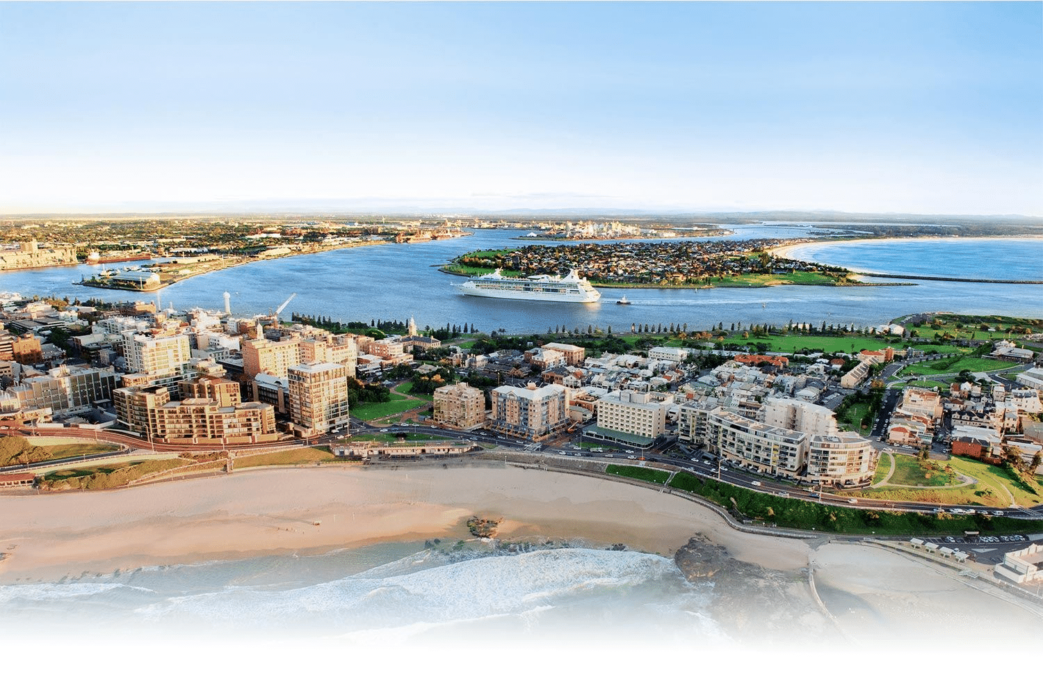 Alt text: aerial view of Newcastle city and Tyne River, ideal for senior-friendly outings