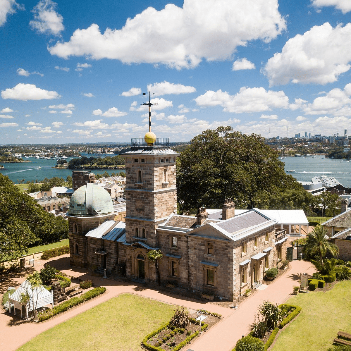 An aerial view of a clock tower building in Sydney
