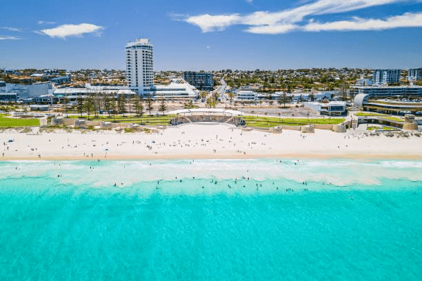 An aerial view of a Perth beach with cityscape in the background