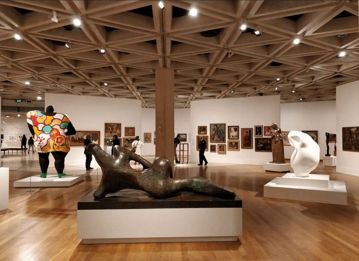 Art-filled room with various sculptures in Perth museum