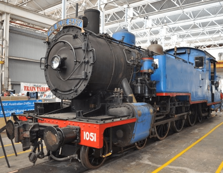 Blue and red train at Brisbane station for school excursions