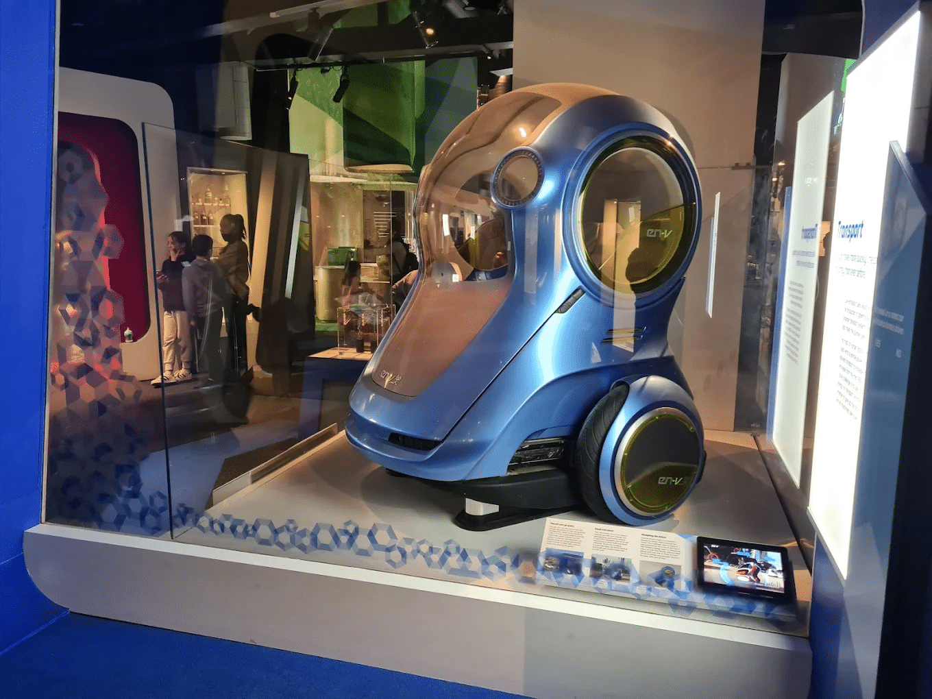 Blue and silver robot in display case at Melbourne excursion