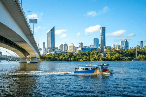 Boat on river under bridge at South Bank Parklands, Brisbane