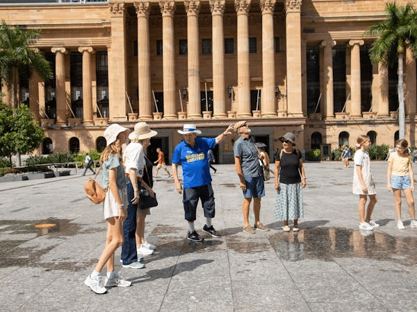Church group gathered in front of a Brisbane building