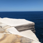 Cliffside view of ocean in Sydney for budget travelers