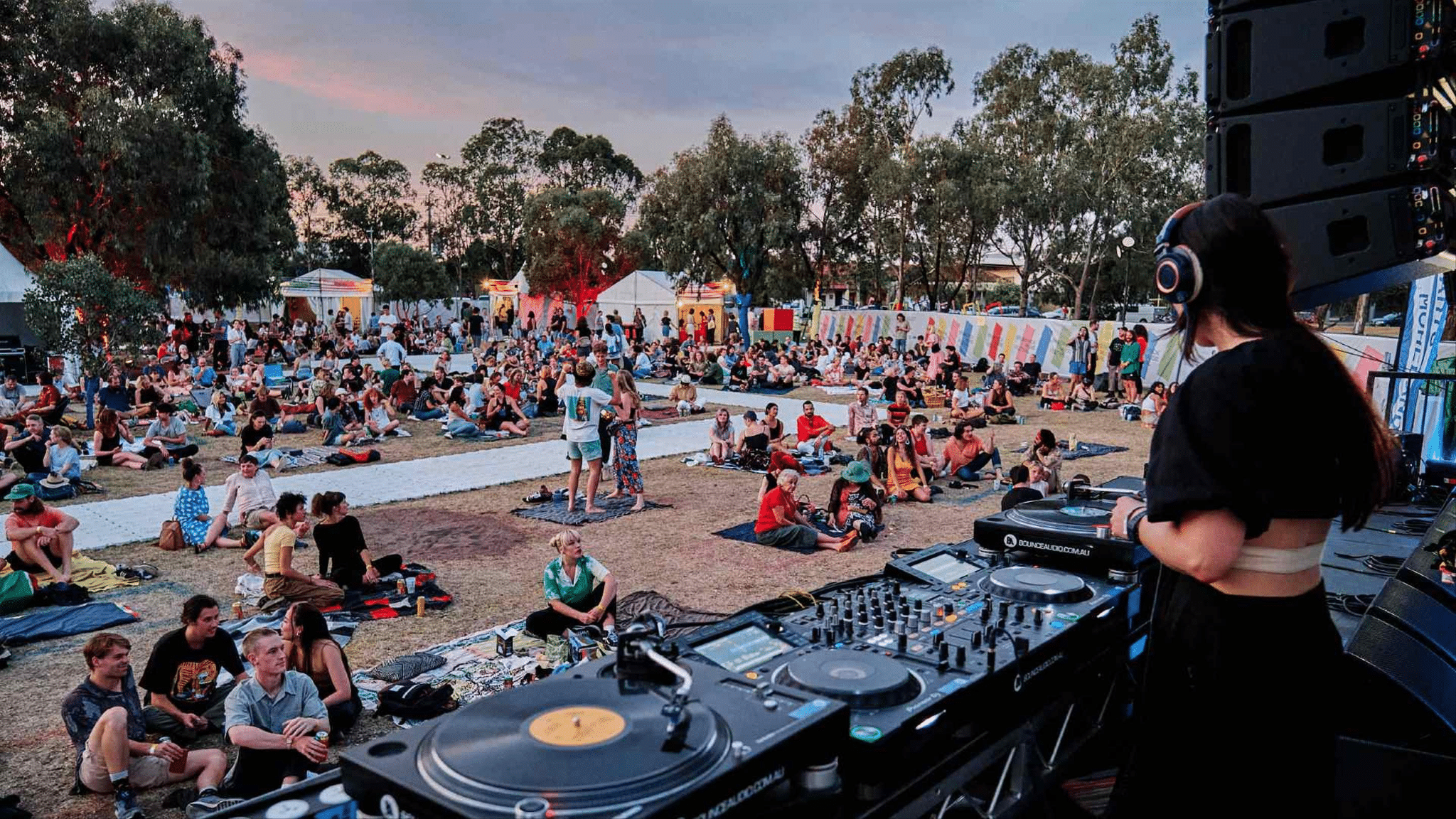 Crowd enjoying live music at Melbourne DJ booth