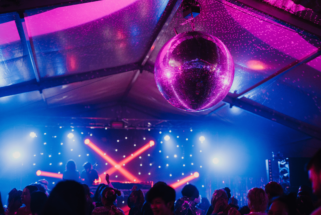 Crowd gathered around disco ball at Launceston event