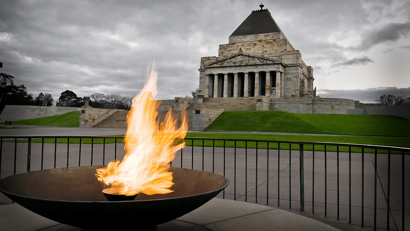 Fire pit with historic building in Melbourne backdrop