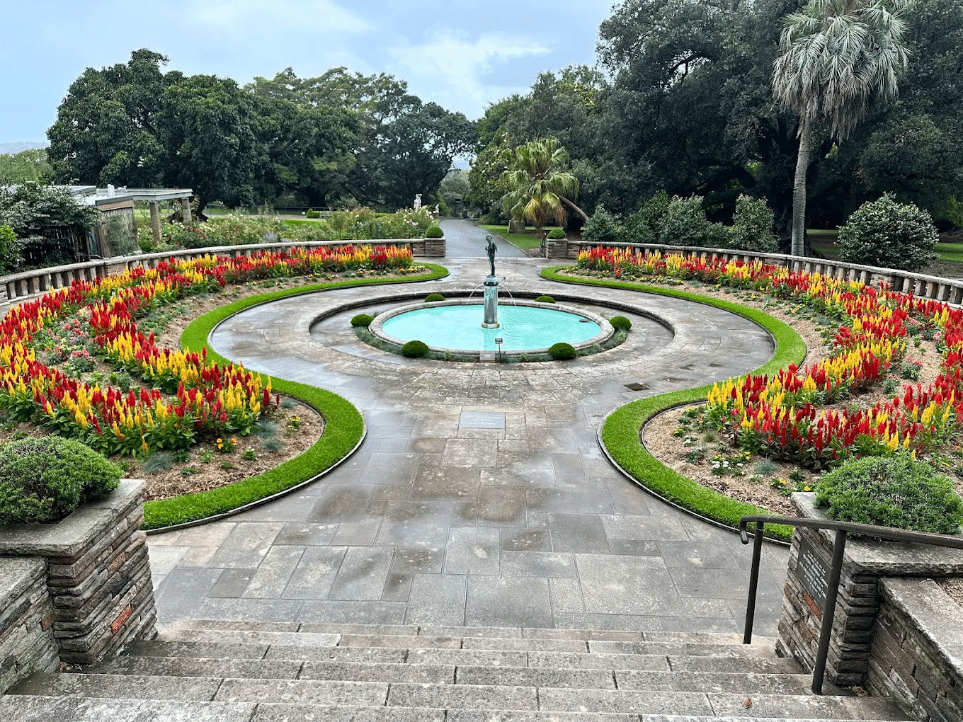 Garden with fountain and colorful flowers in Sydney