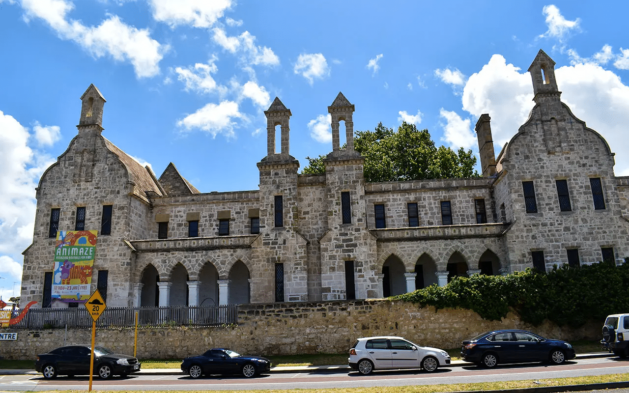 Historic stone building alongside a road in Perth day trip