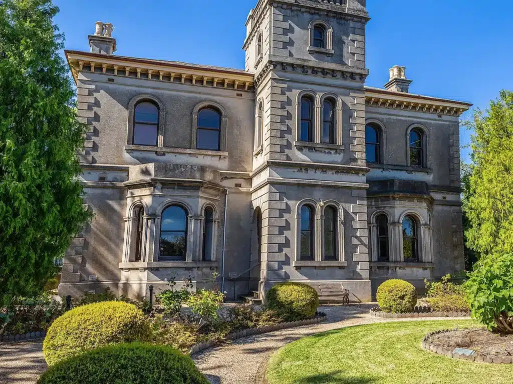 Historic stone building with clock tower in Boroondara Melbourne