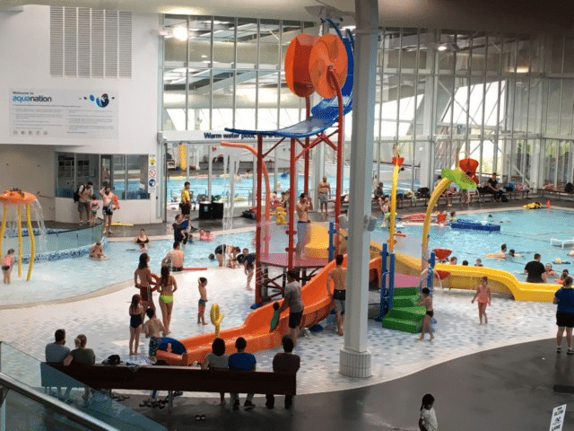 Indoor swimming pool crowded with people in Maroondah