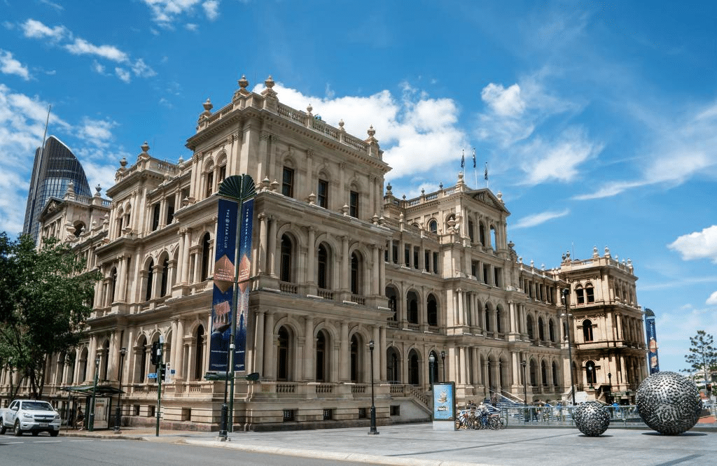 Large corner building under blue sky