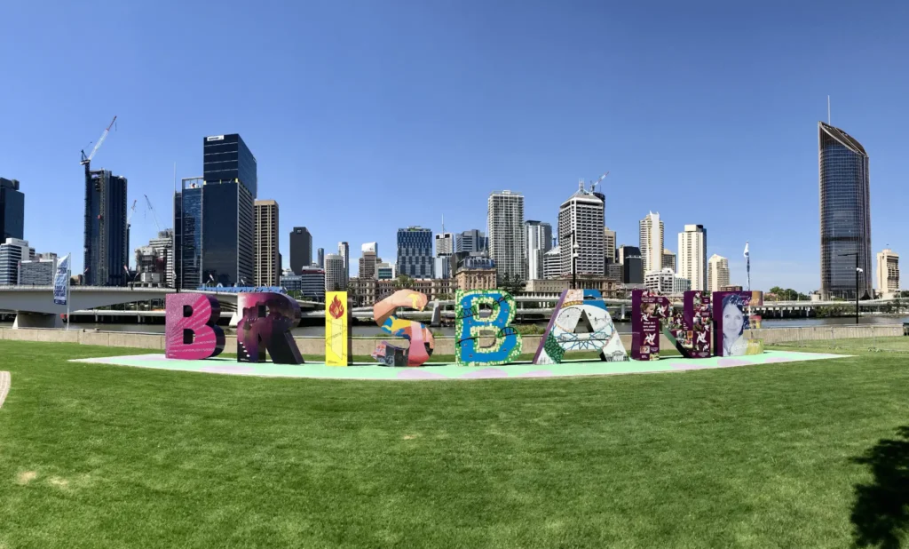 Large field sign with Brisbane city backdrop