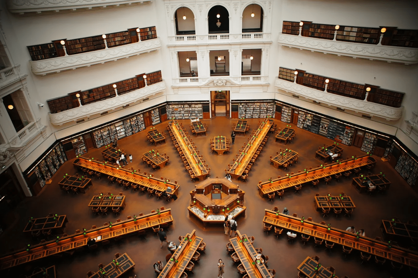 Library interior with numerous bookshelves filled with books