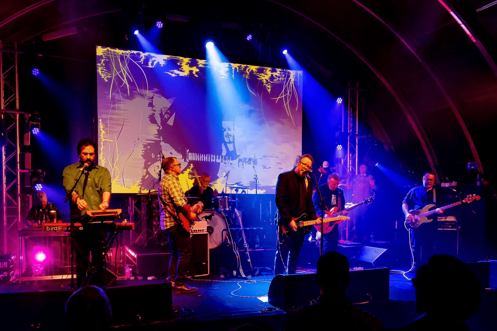 Live band performing on stage in Brisbane music venue