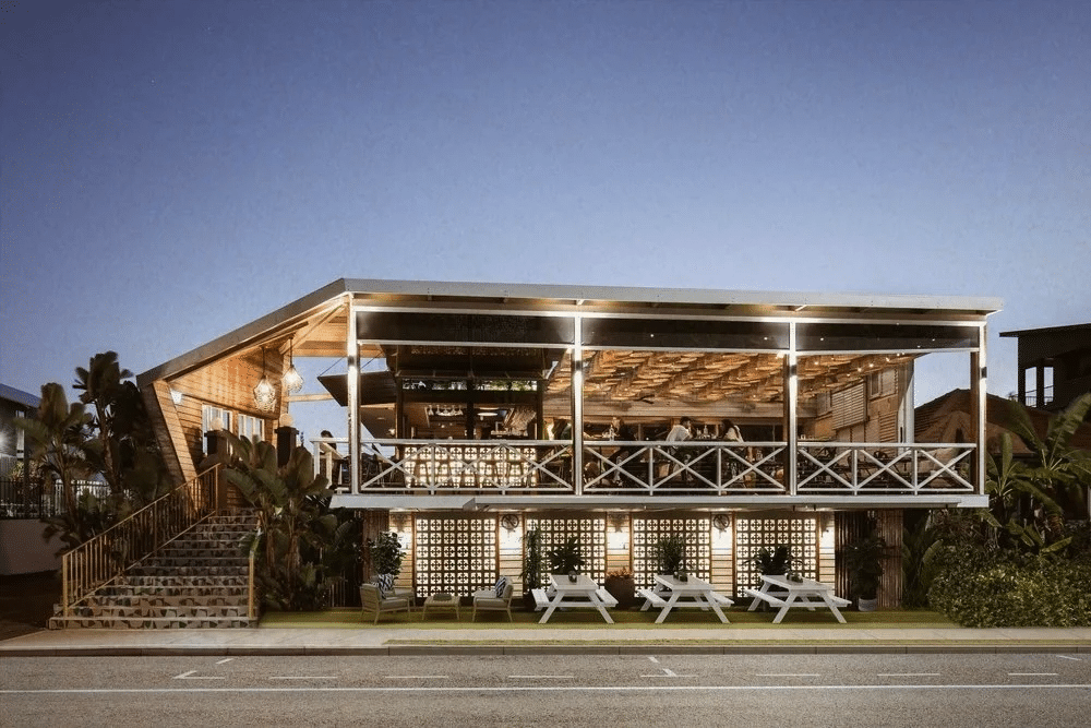 Outdoor dining tables in front of Townsville restaurant building