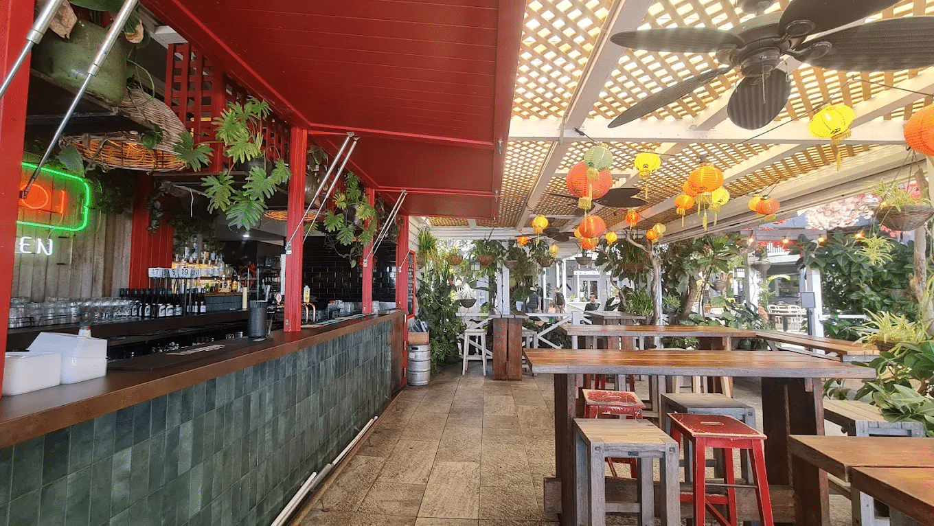 Outdoor restaurant setup in Sunshine Coast with many tables and chairs