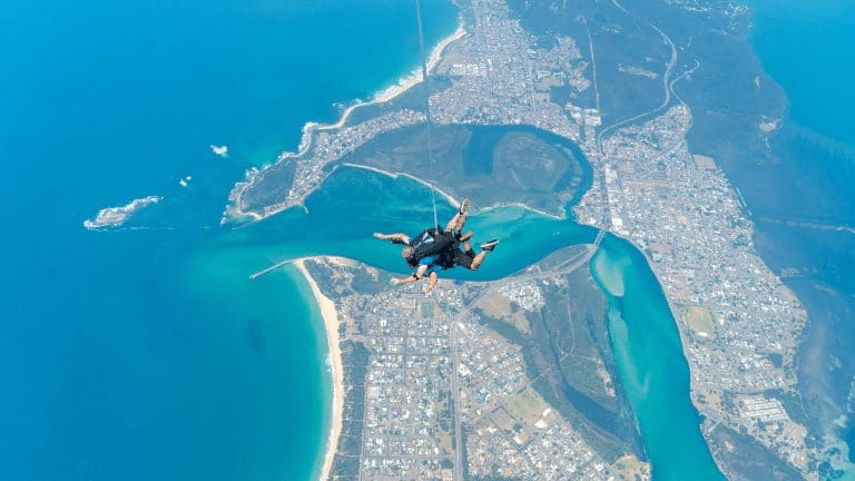 Parachute aerial city view showcasing Sydney stadiums