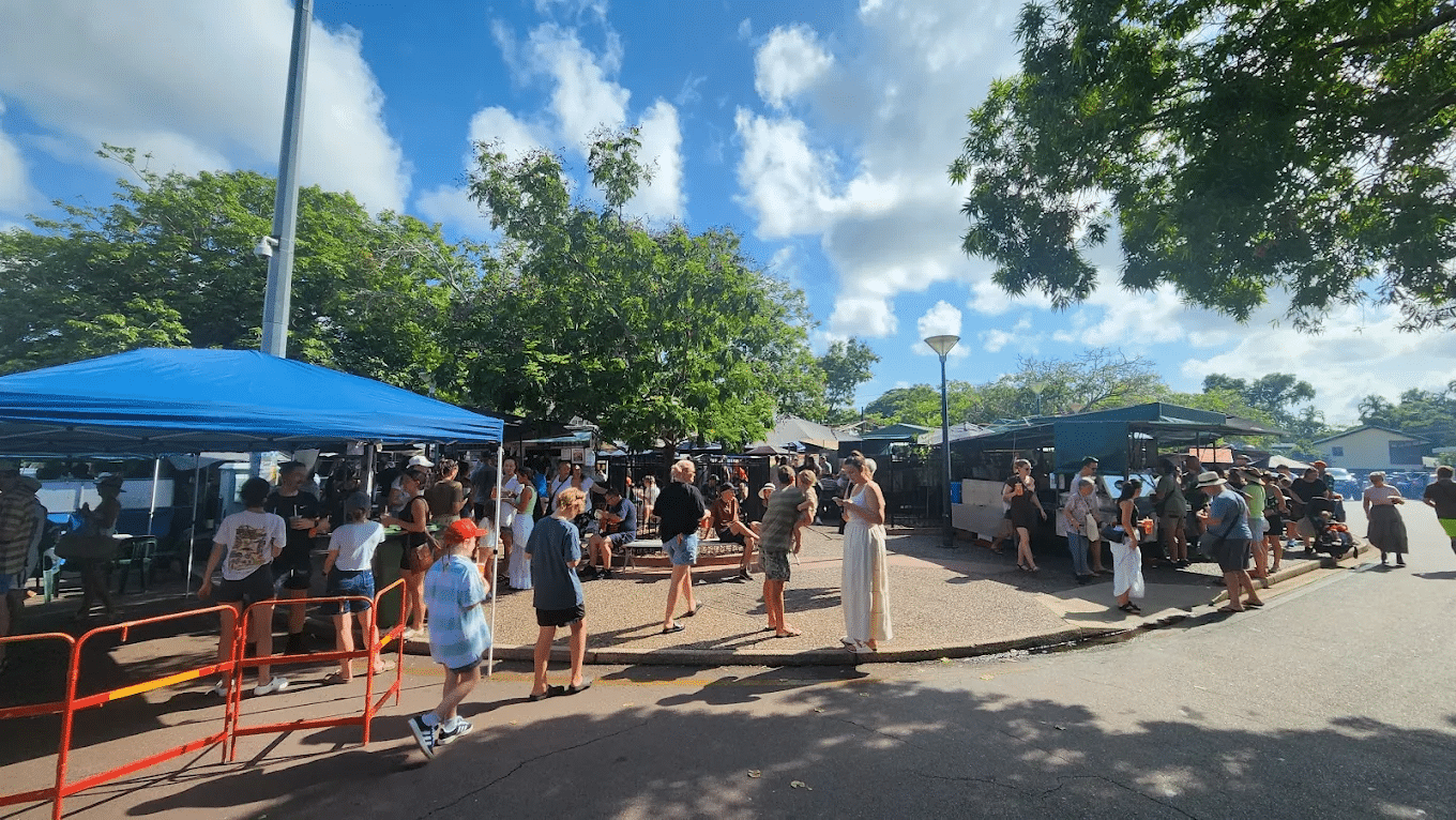People at blue tent on food tour in Darwin