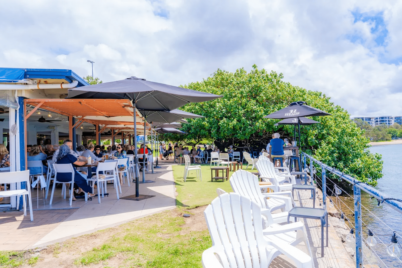 People dining outdoors at a Sunshine Coast food tour event
