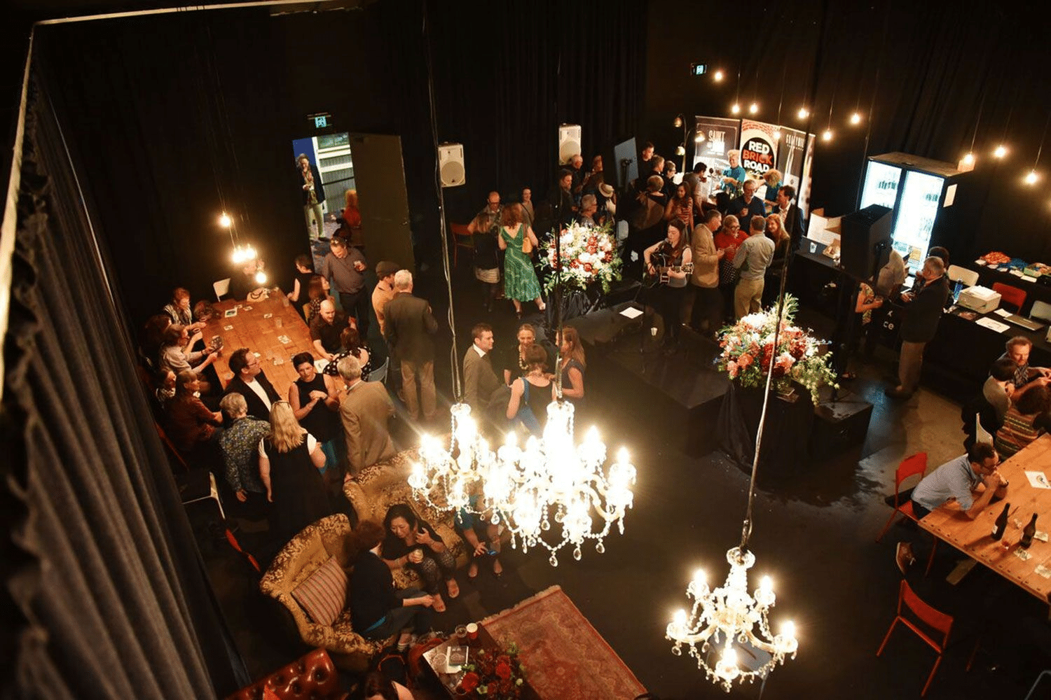People sitting around a table at a group event in Launceston