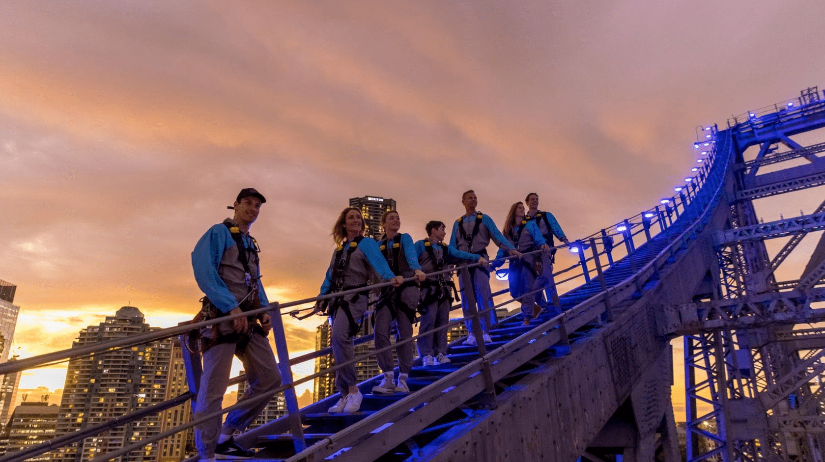 People walking on a bridge in Brisbane