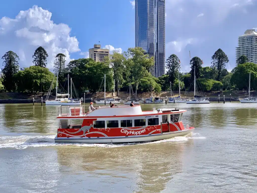 Red and white boat in Brisbane river